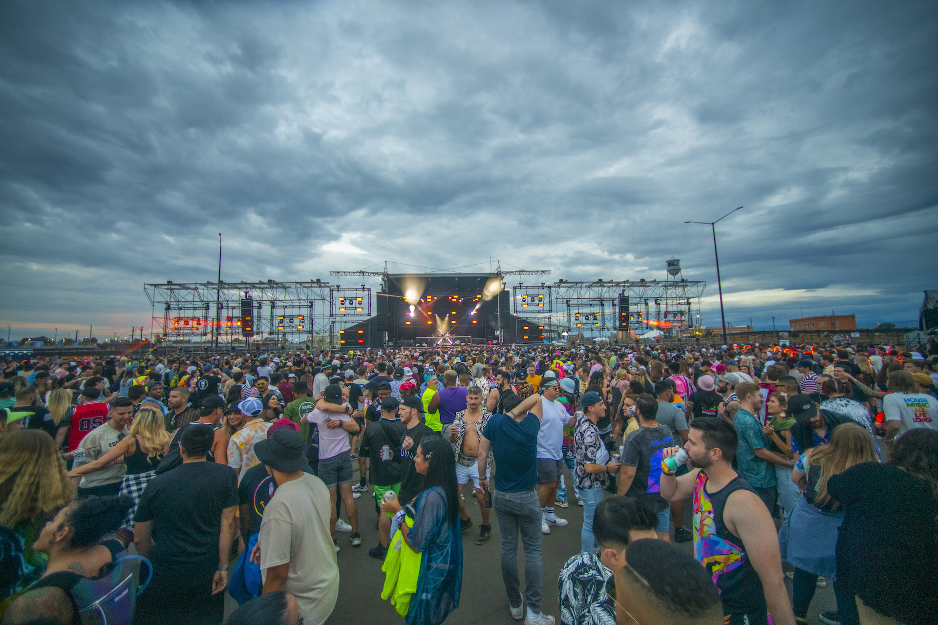 Large crowd at an outdoor concert.